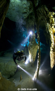 Diver in Cenote Dos Ojos. by Girts Kravalis 
